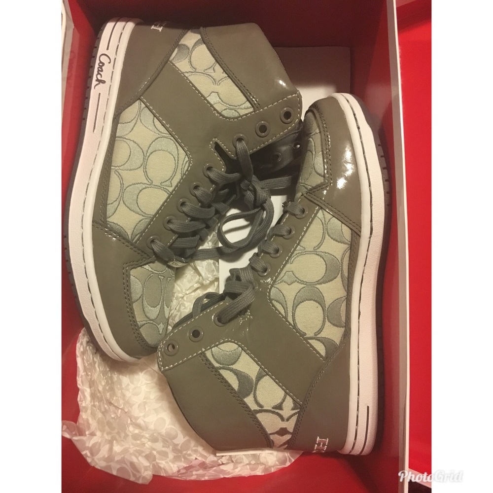 Coach sneakers with small heel. Never worn